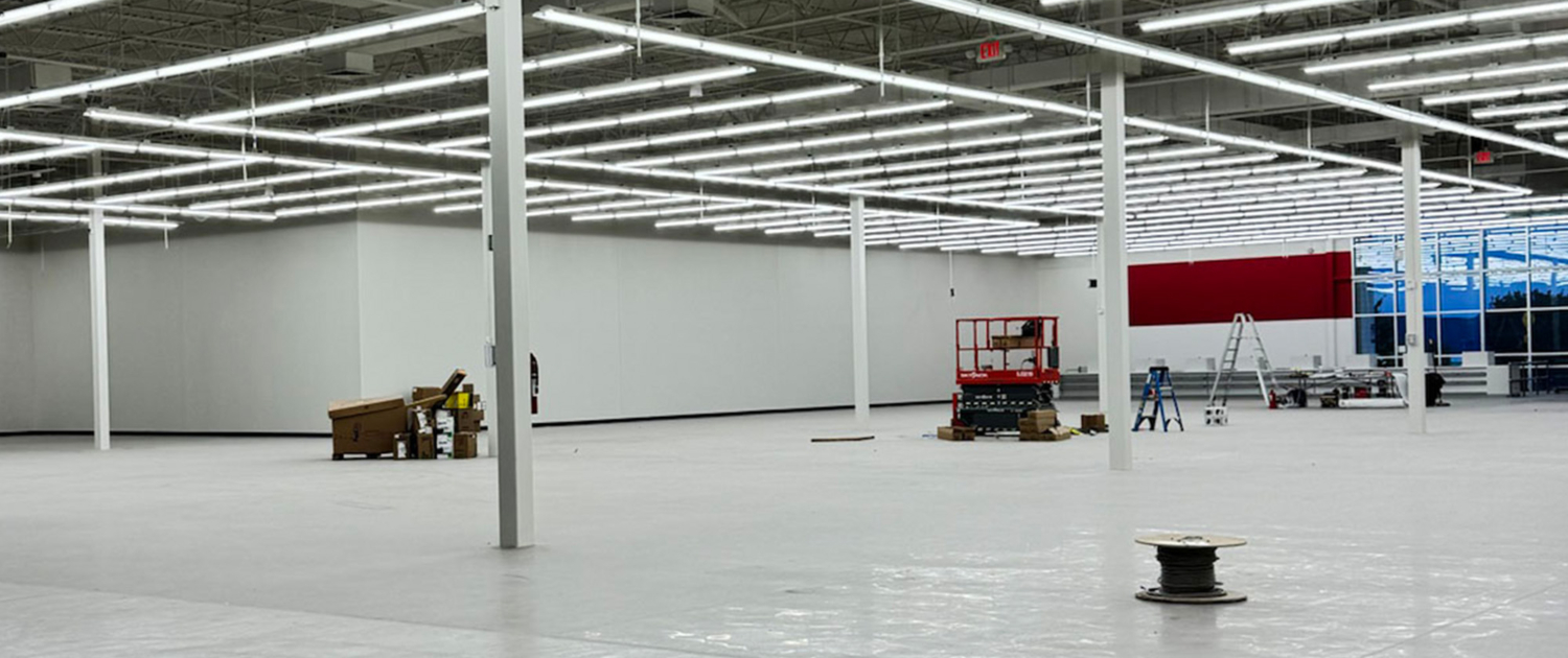 Interior view of large retail space construction